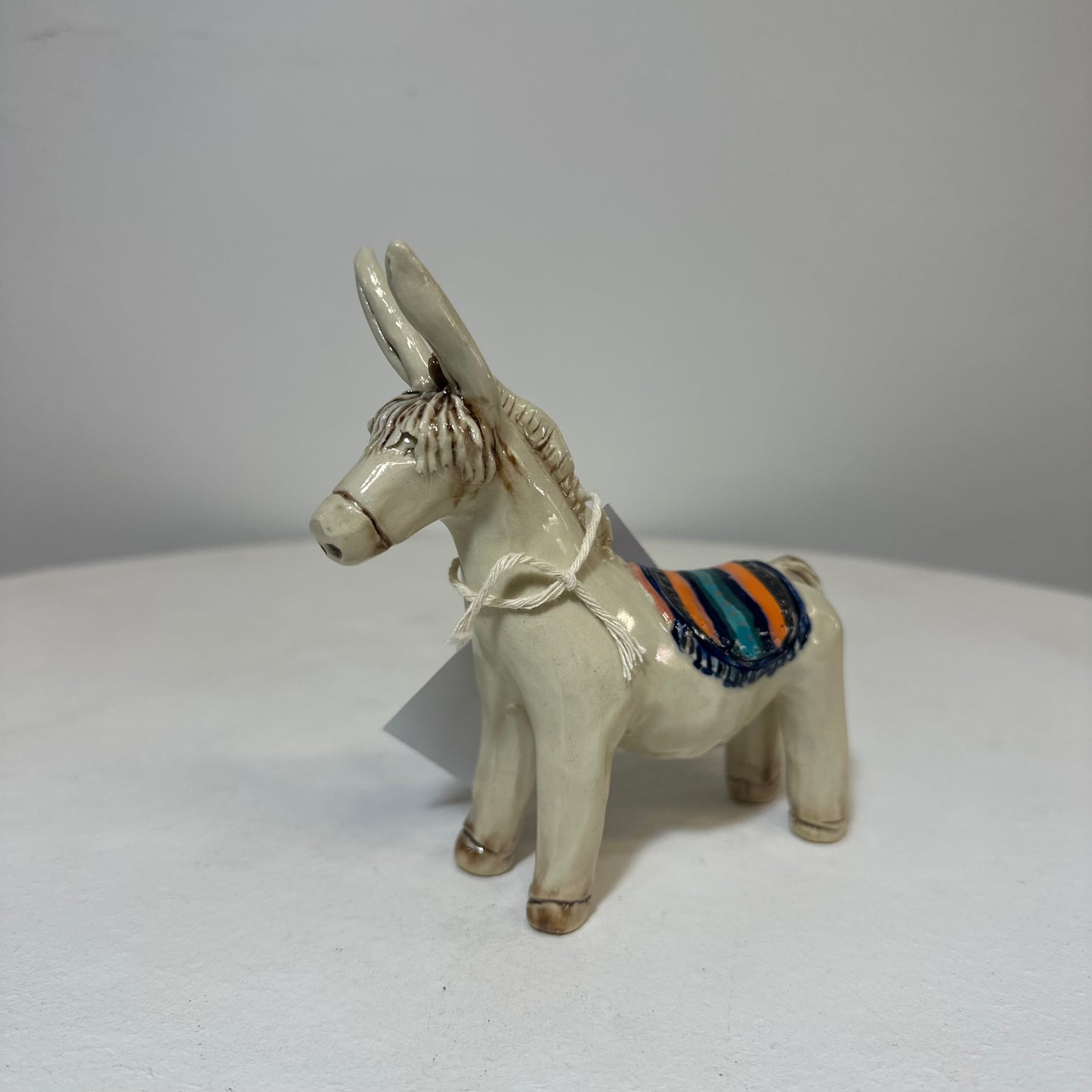 Ceramic Donkey- orange and black cloth